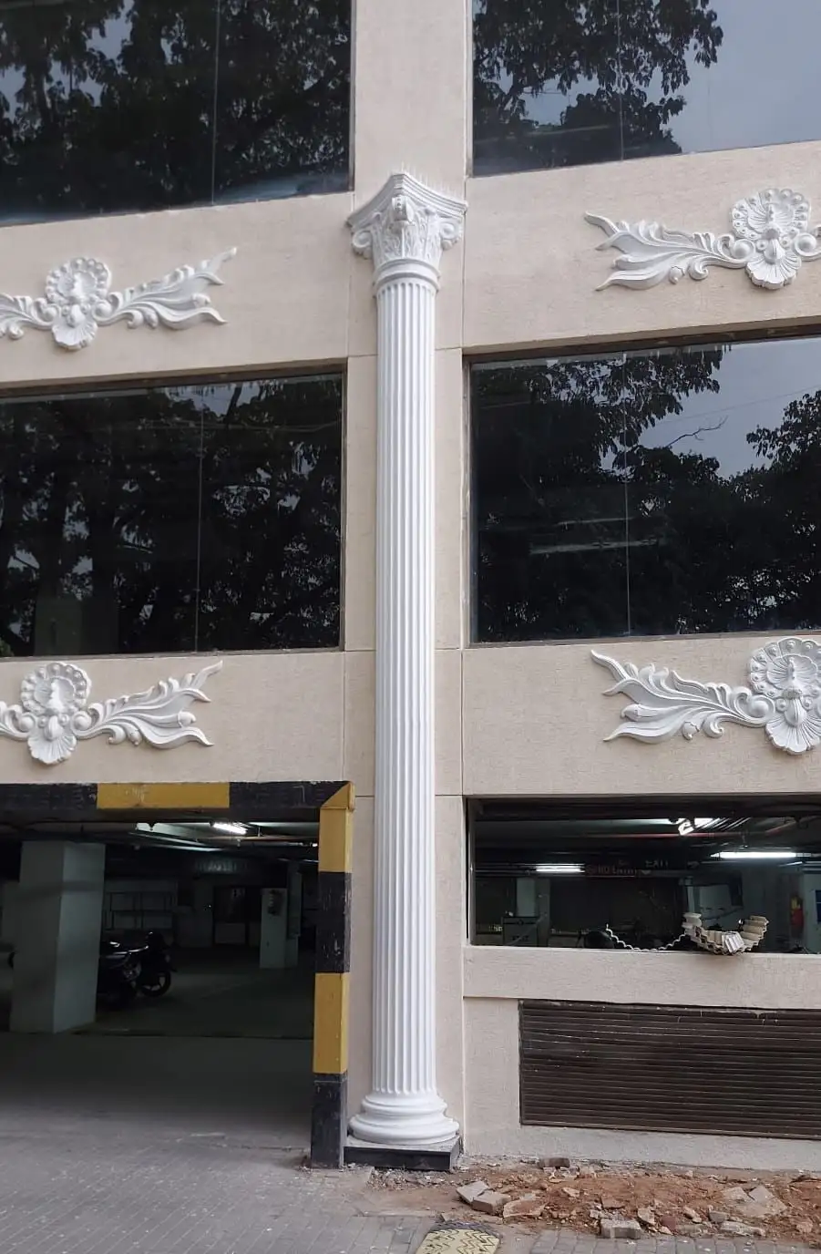 1 MG-Lido Mall, MG Road, Bengaluru: Columns and ornaments rising through three storeys beside the parking entrance