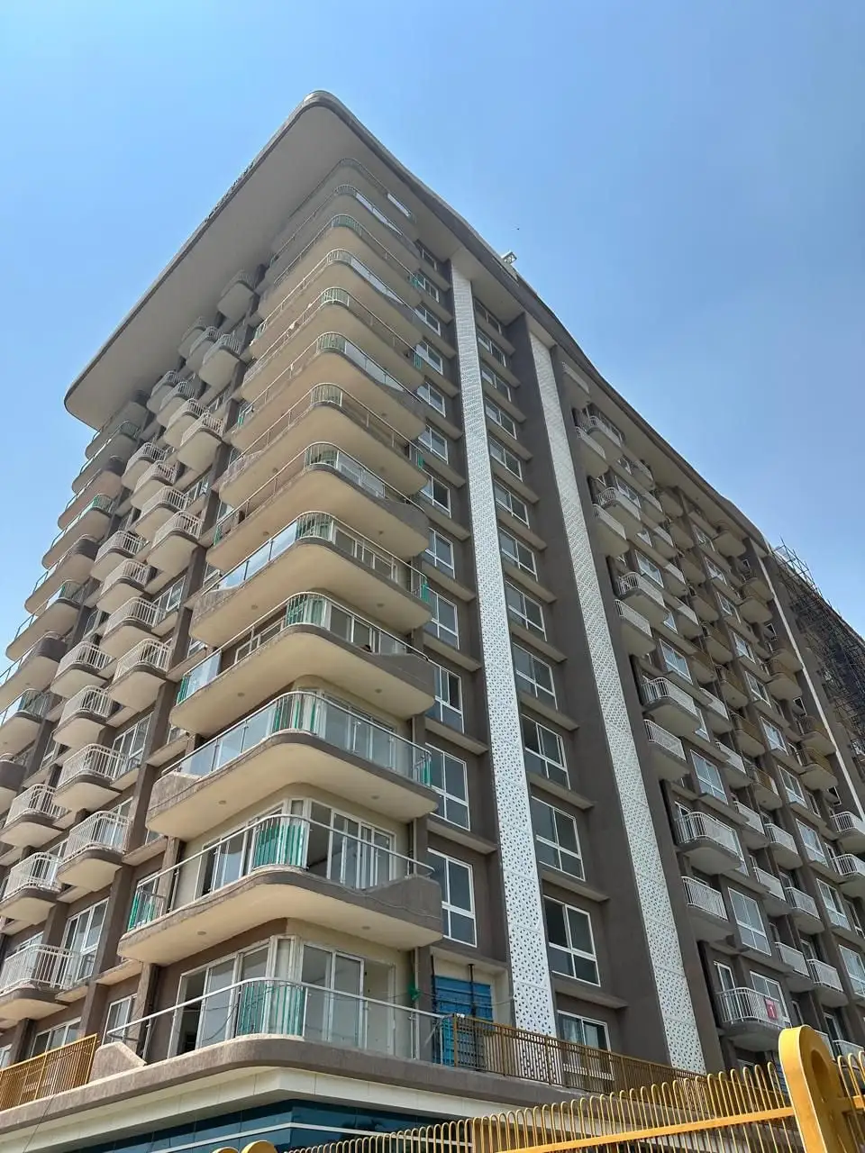 Aero One, Devanahalli, Bengaluru: The tower from the street, with two jaali bands running its full height