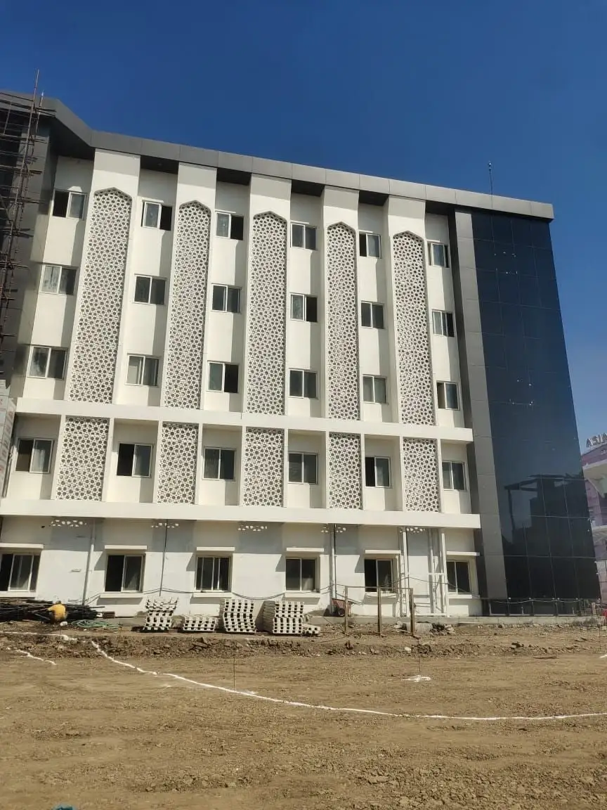 KBN Hospital, Kalaburagi, Karnataka: Jaali panels on every floor of the side wing, photographed before the scaffolding came down