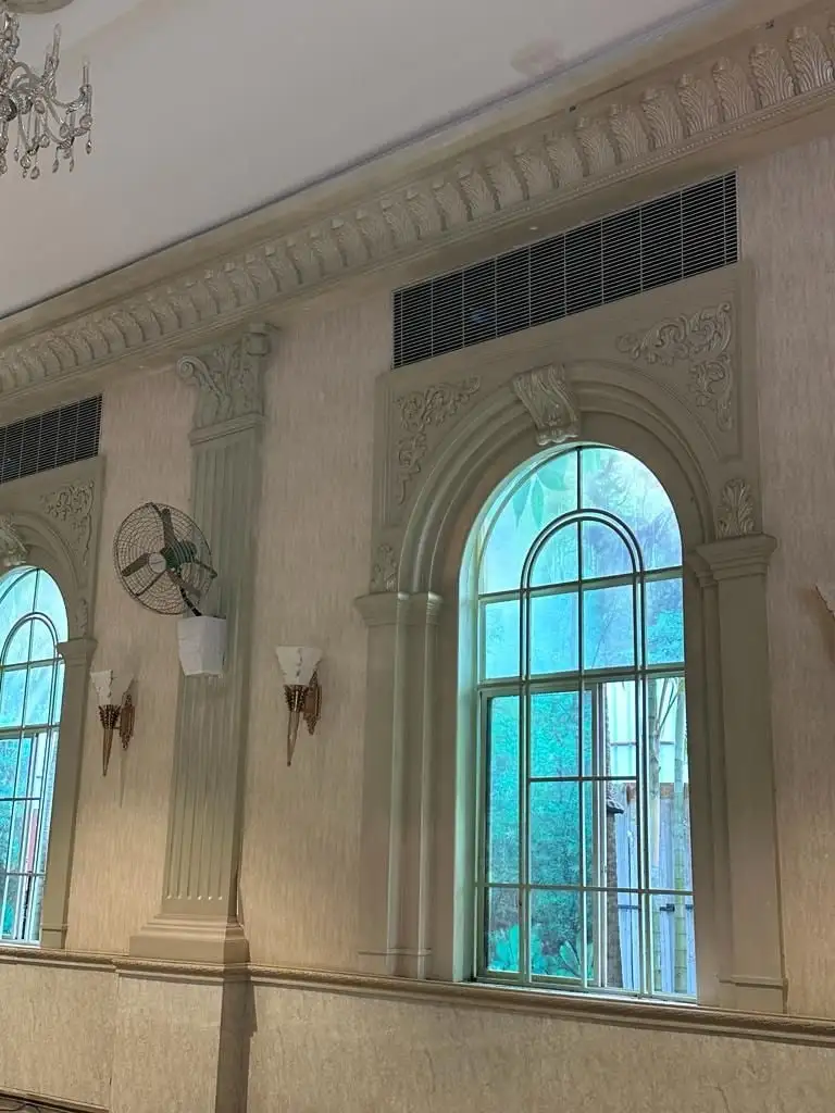 Princess Golf: An arched window surround with a keystone, between pilasters
